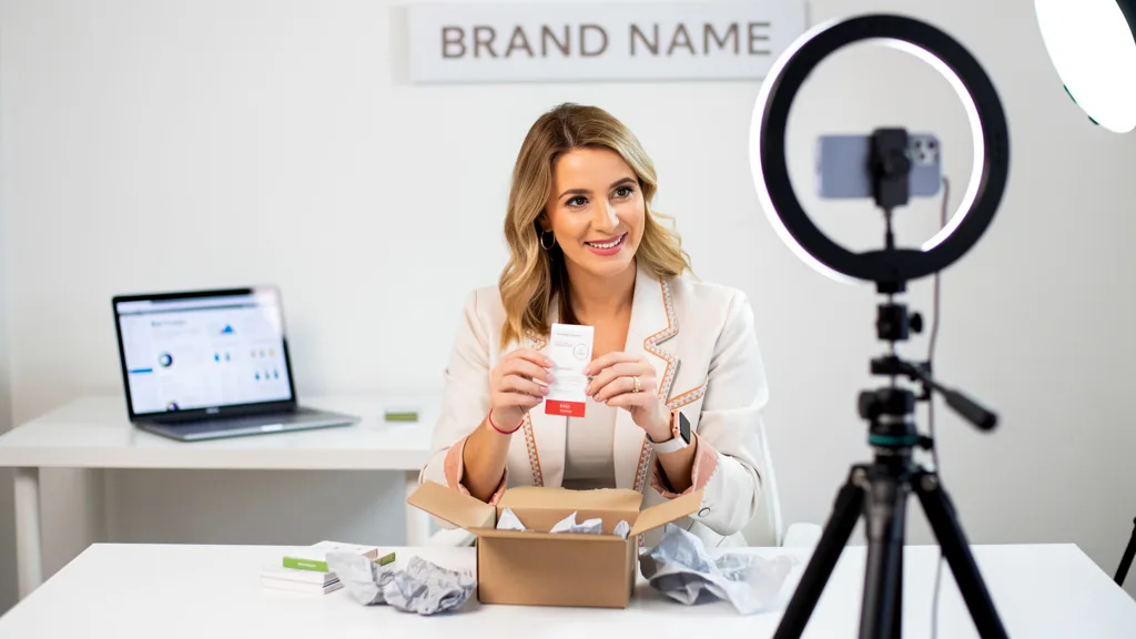 An influencer creating an unboxing Reel to promote an Amazon product to their followers.